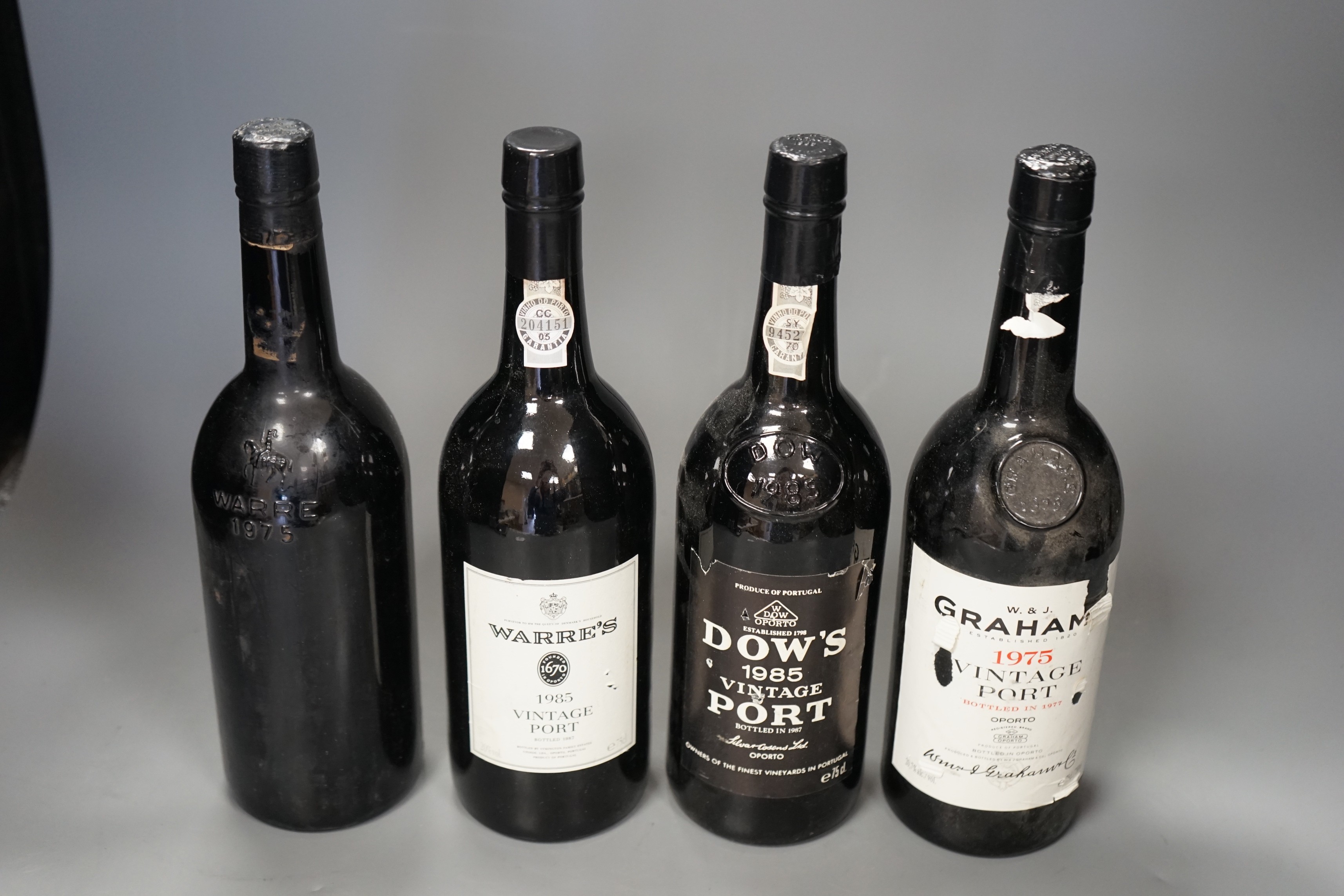 Four bottles of Vintage Port: Grahams Warres Dow's (4) 1975x2, 1985x2